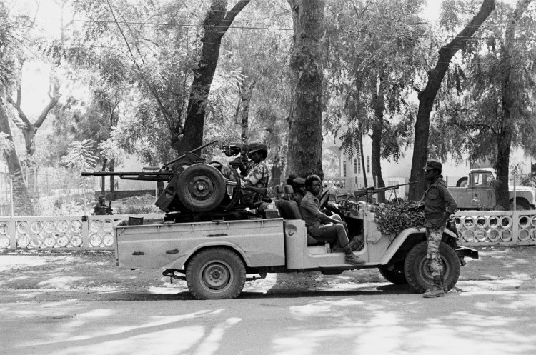 soldiers in their truck long shot side view ndjamena 1982