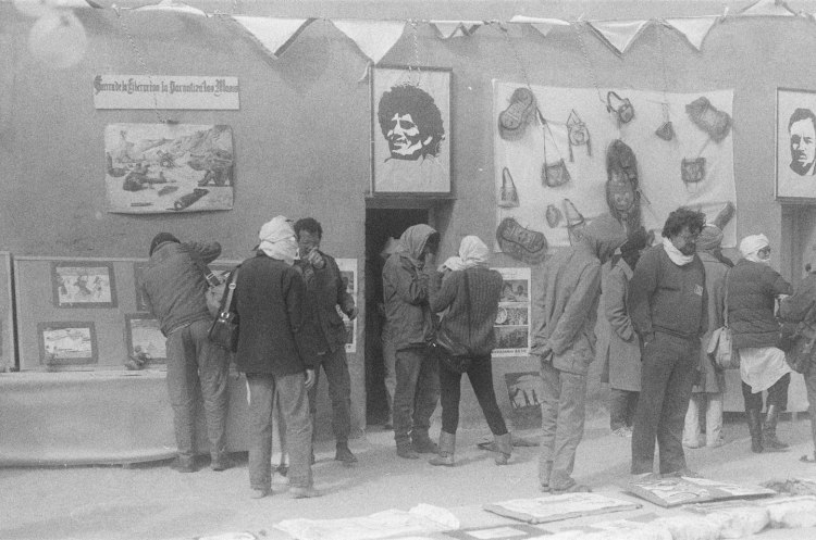 visitors look at exhibition polisario ten year celebration western sahara 1986