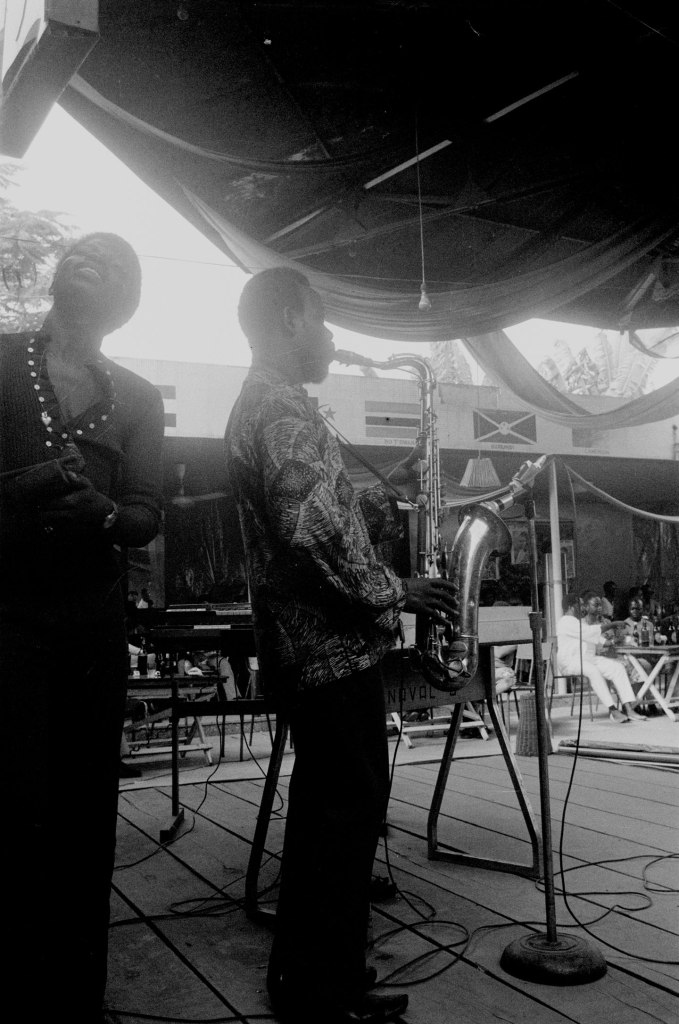 sax player and percussionist on stage shrine lagos nigeria